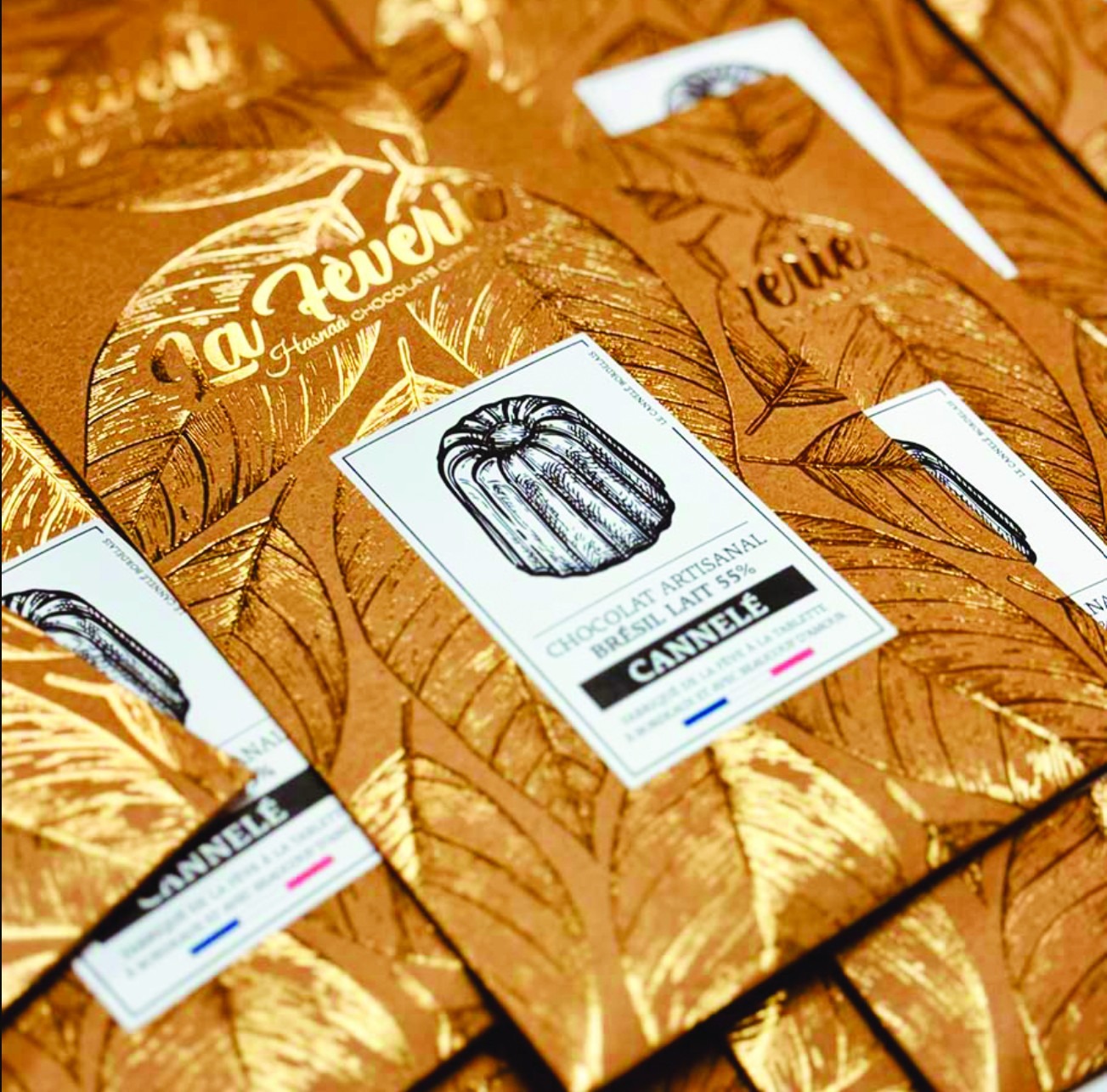 Hasnaâ Chocolat Grands Crus 55% milk chocolate bar and Bordeaux cannelé